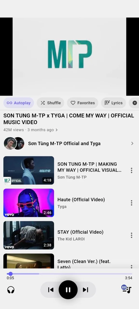 Ground Music video player showing a YouTube music video with related songs below